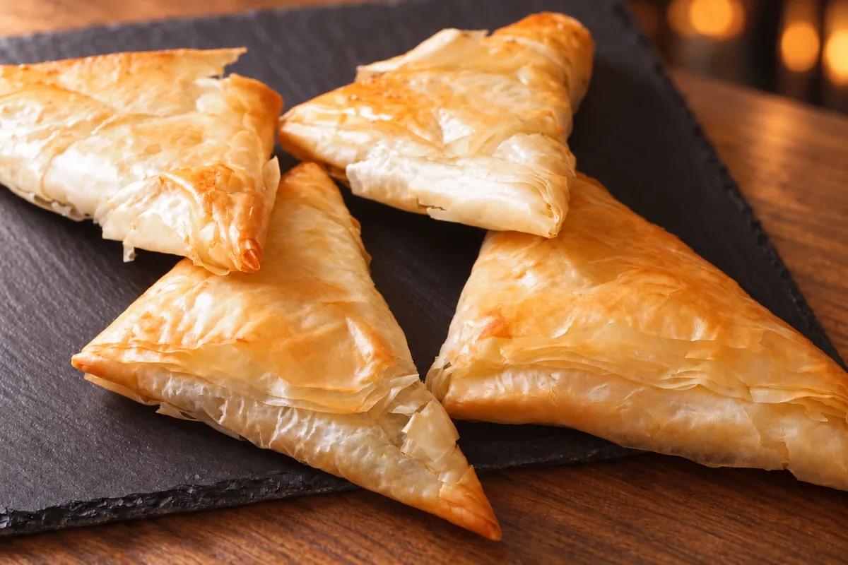 Spanakopita, golden phyllo triangles